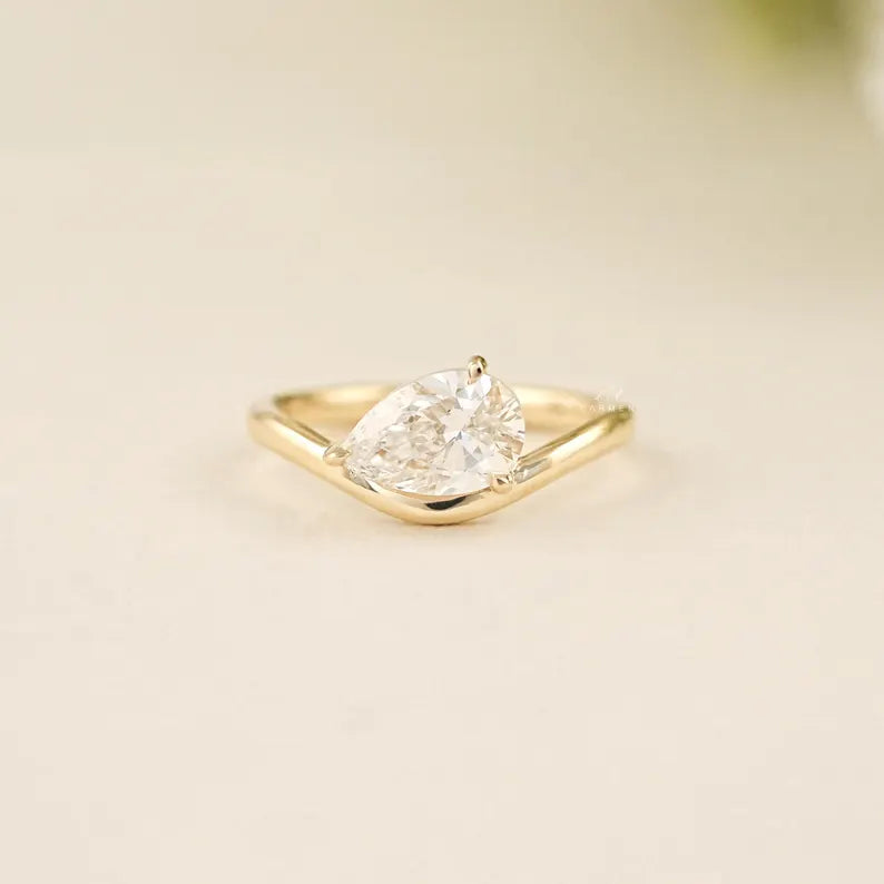 Pear Curved Solitaire Ring