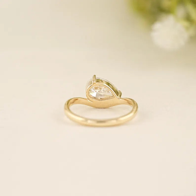 Pear Curved Solitaire Ring