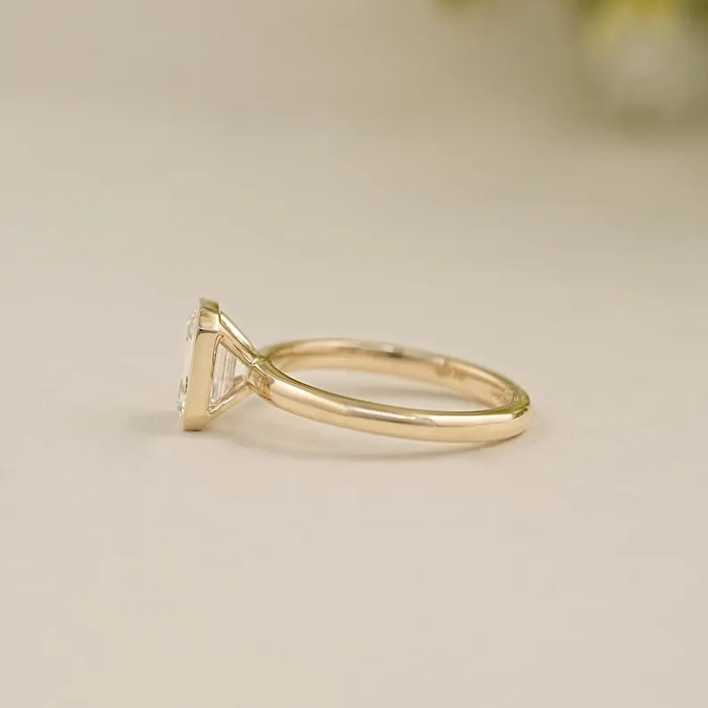 Emerald Bezel Solitaire Ring