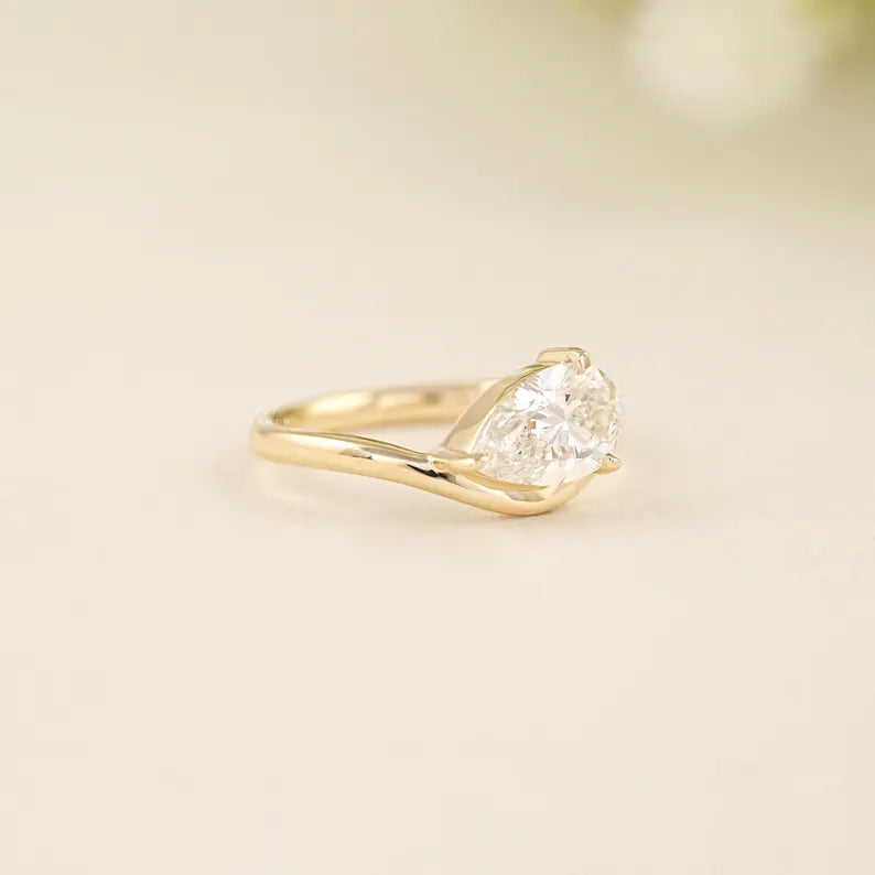 Pear Curved Solitaire Ring