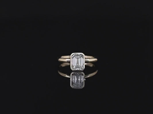 Emerald Bezel Solitaire Ring